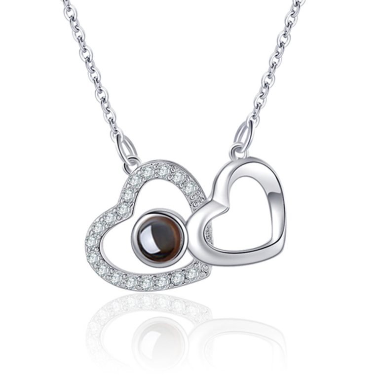 double heart photo projection necklace in 18K gold plating showing a hidden picture