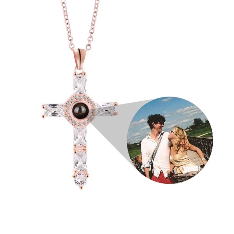 Rose gold crystal cross necklace projecting a custom photo of a couple